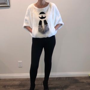 Real white mink jacket. Can be worn two ways.